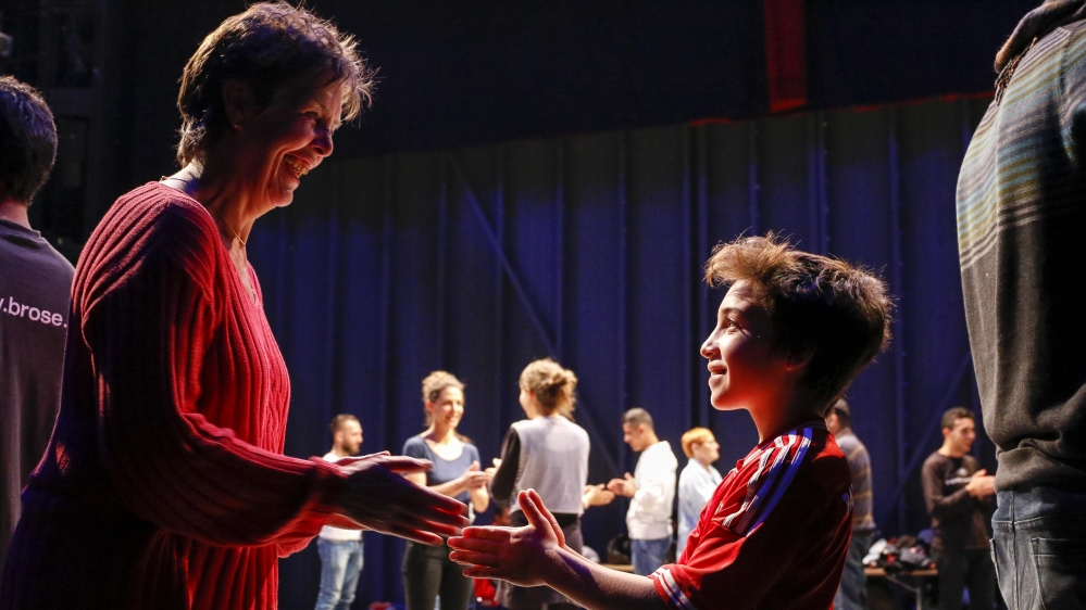 Refugee youth partake in the international cafe's theatre activities and perform skits based on their own experiences [Daniel Koch/Staatsschauspiel Dresden]