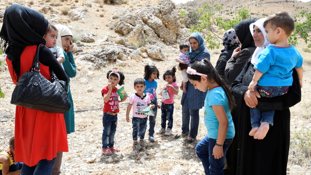 Syrian Refugees at Lebanon's border region of Arsal earlier in July [Hassan Abdallah/Reuters]