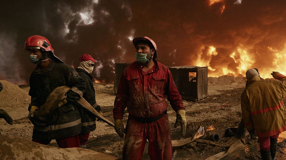 Many of the Iraqi firefighters who risked their lives to extinguish the oil fires in Qayyara experienced respiratory complications [Joey Lawrence/Al Jazeera]