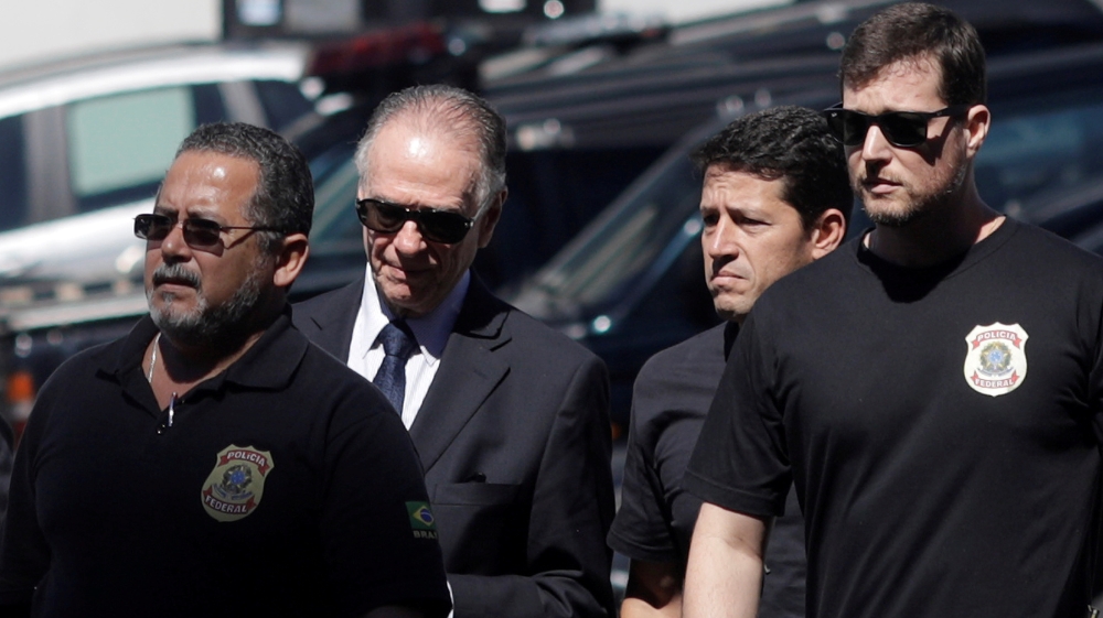 Brazilian Olympic Committee (COB) President Carlos Arthur Guzman arrives to Federal Police headquarters in Rio de Janeiro