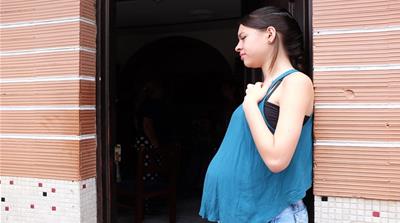Gladys' daughter Angie Lizeth Rojo Betancur, 16, is photographed a week before she was due to give birth to a son, the only male in the all-female household [Sruthi Gottipati/Al Jazeera]