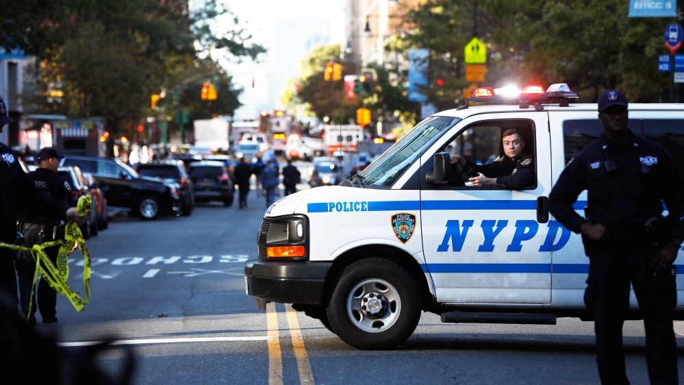 Police block off the street after a shooting incident in New York City