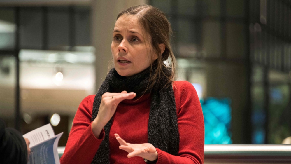 Leader of the Left-Green movement, Katrin Jakobsdottir, meets people at a stand of her party set up at the Kringlan shopping mall in Reykjavik [Halldor Kolbeins/AFP/Getty Images]