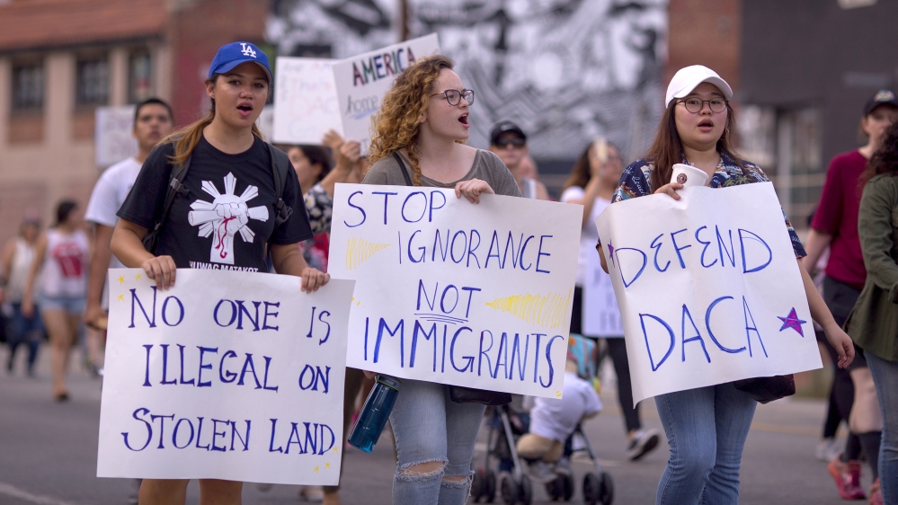 Trump has made toughening immigration regulations a central part of his first year in office [David McNew/Getty Images]