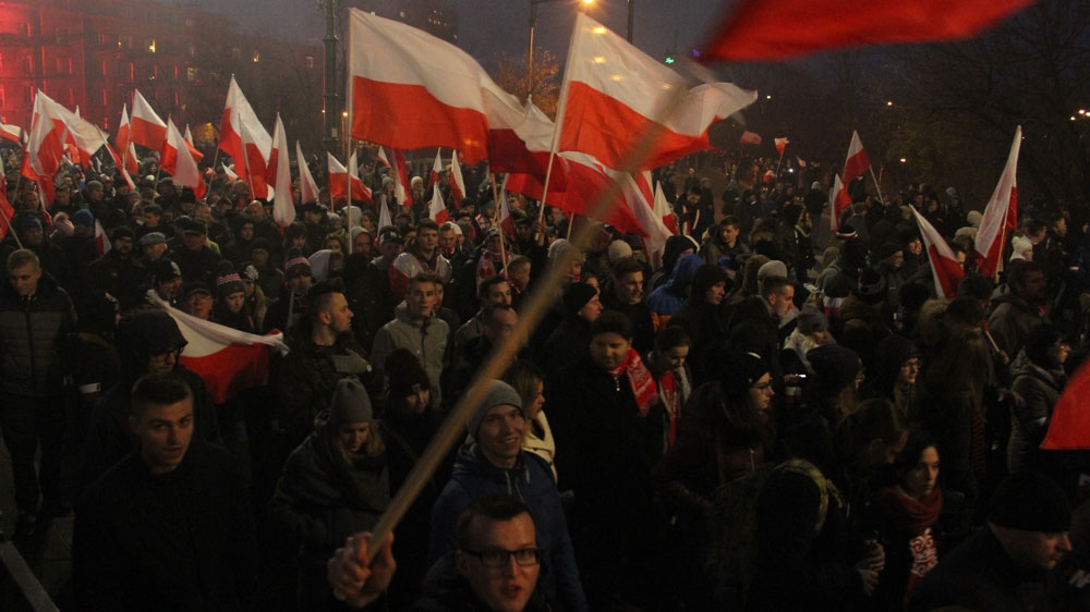 'The whole Poland sings with us: f*** off with the refugees' was one of the chants that echoed during the march [Agnieszka Pikulicka-Wilczewska/Al Jazeera]