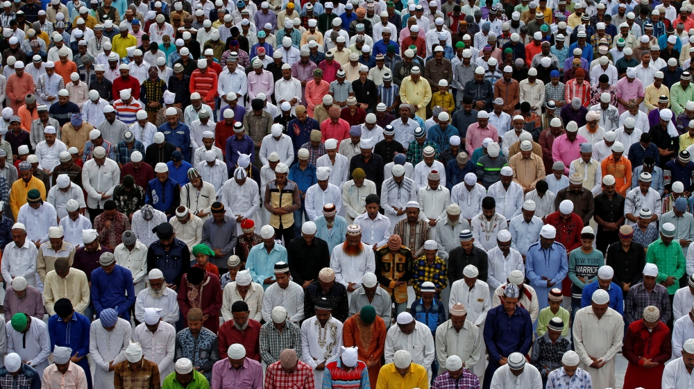 Muslims offer Eid al-Adha prayers inside the Sarkhej Roza mosque in Ahmedabad