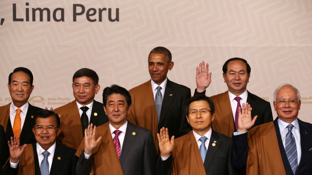 U.S. President Barack Obama and fellow heads of state pose for a family photo during the APEC (Asia-Pacific Economic Cooperation) Summit in Lima