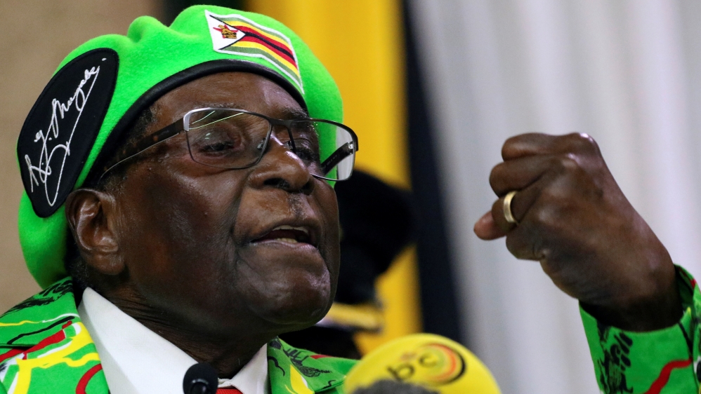 Zimbabwean President Robert Mugabe addresses a meeting of his ruling ZANU PF party''s youth league in Harare