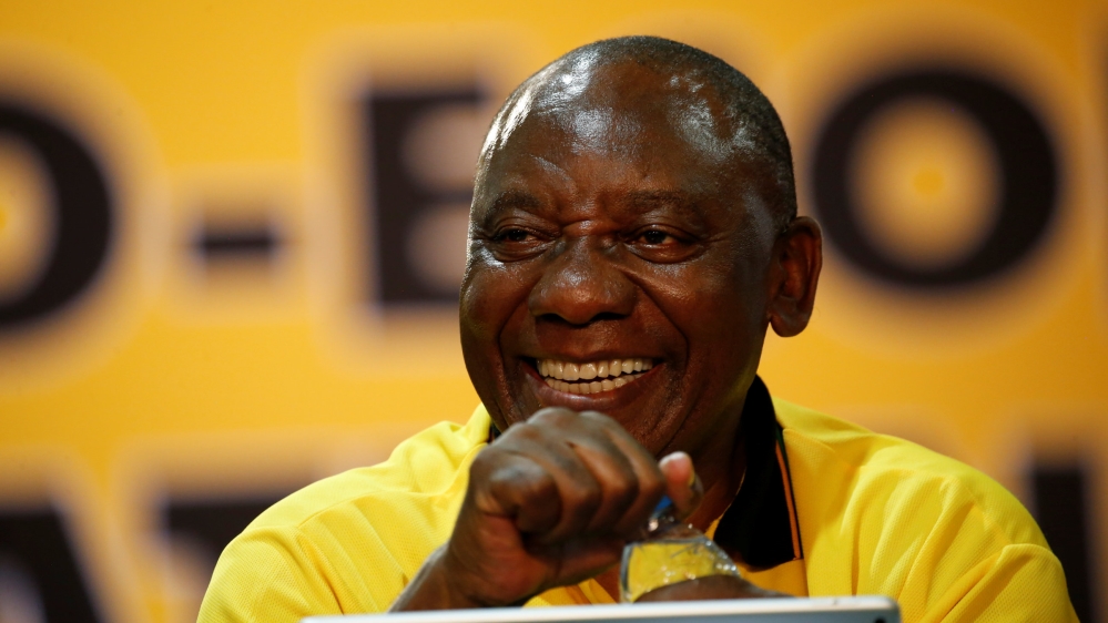 Deputy president of South Africa Cyril Ramaphosa reacts during the 54th National Conference of the ruling African National Congress (ANC) at the Nasrec Expo Centre in Johannesburg