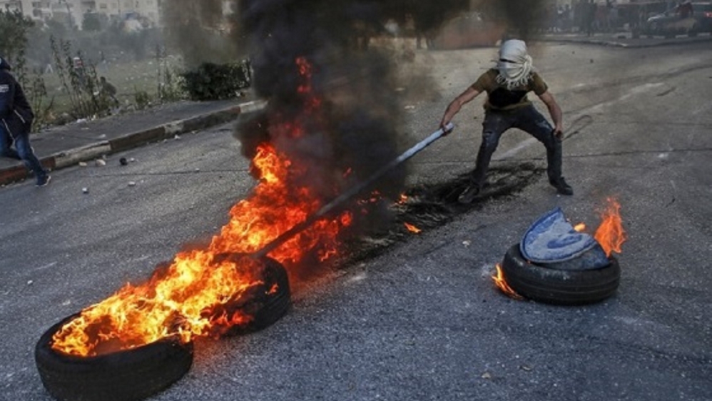 Protests spread to the West Bank on Friday [Abbas Momani/AFP]
