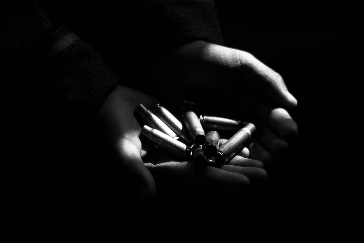 A child shows cartridges of bullets he has collected at gunfight site at village Chaigund on Jan. 25, 2018 in Shopian district, about 48 km south of Srinagar city, the summer capital of Indian-contr