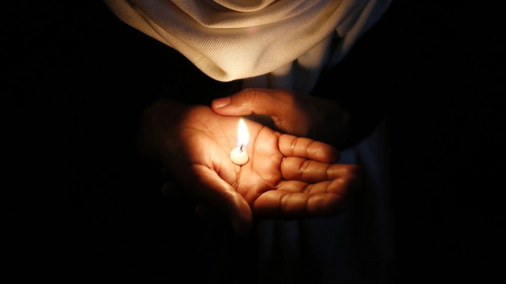 Women''s rights protest candle Reuters