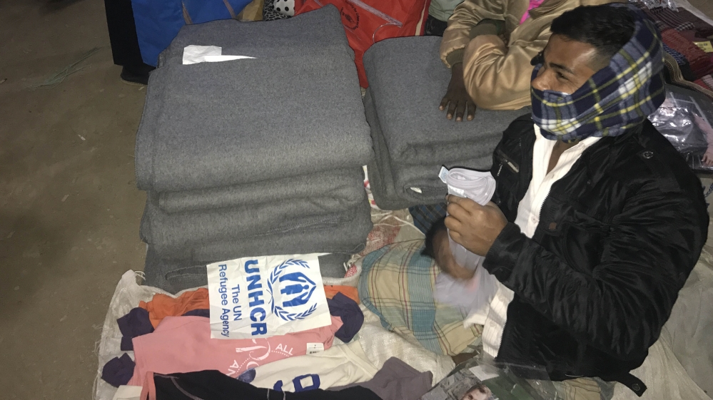 Several refugees told Al Jazeera they have sold their food assistance packages to raise money [Ashish Malhotra/Al Jazeera]