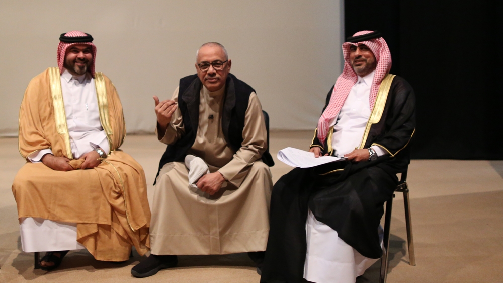 Qatari actor and playwright Ghanem Al Sulaiti, centre, sees the blockade as an opportunity for Qatar to grow more self-reliant and for all its people, locals and expats alike, to unite [Showkat Shafi/Al Jazeera]