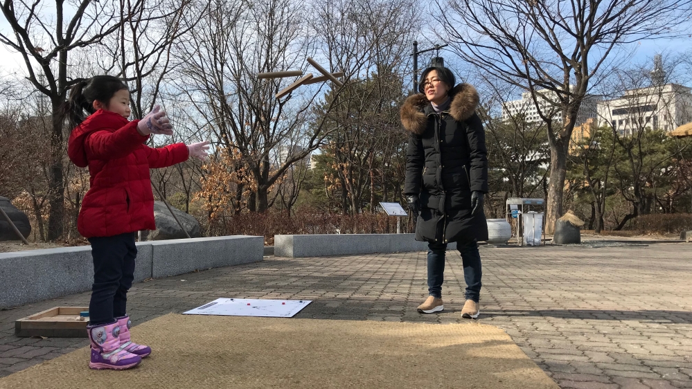 Yoonori is one of the games the children enjoyed during the celebrations [Ann Babe/Al Jazeera]