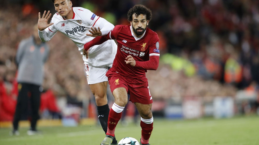 Liverpool's Mohamed Salah is one of few footballers who has scored 30 goals in a season [Frank Augstein/AP]