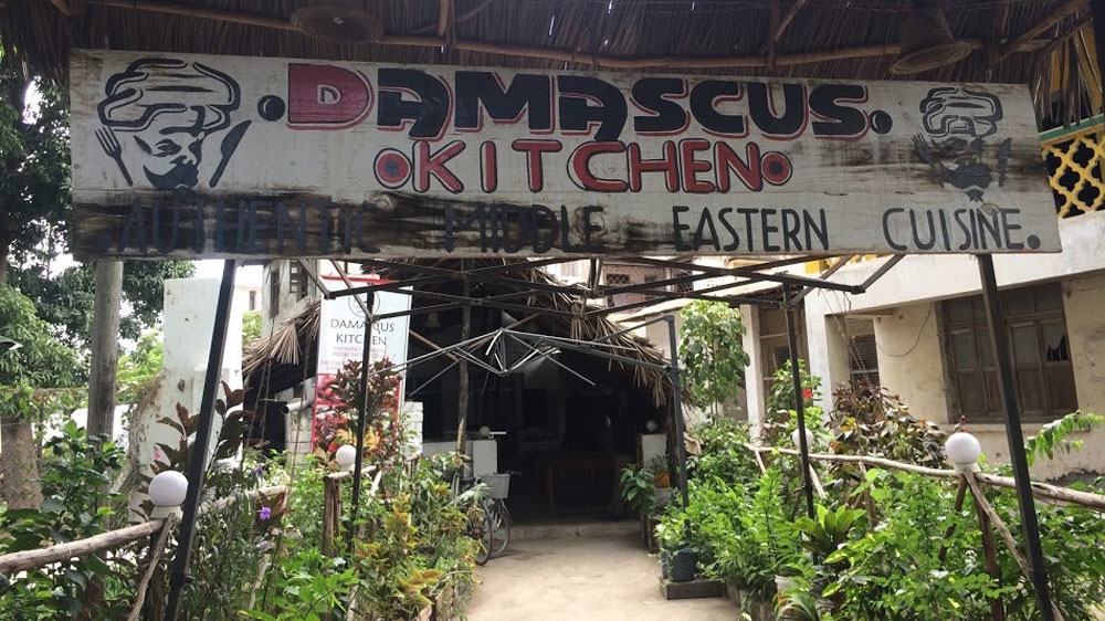 
Labbad was able to launch Damascus Kitchen with the help of a Syrian doctor but has struggled financially at times [Amanda Leigh Lichtenstein/Al Jazeera]
