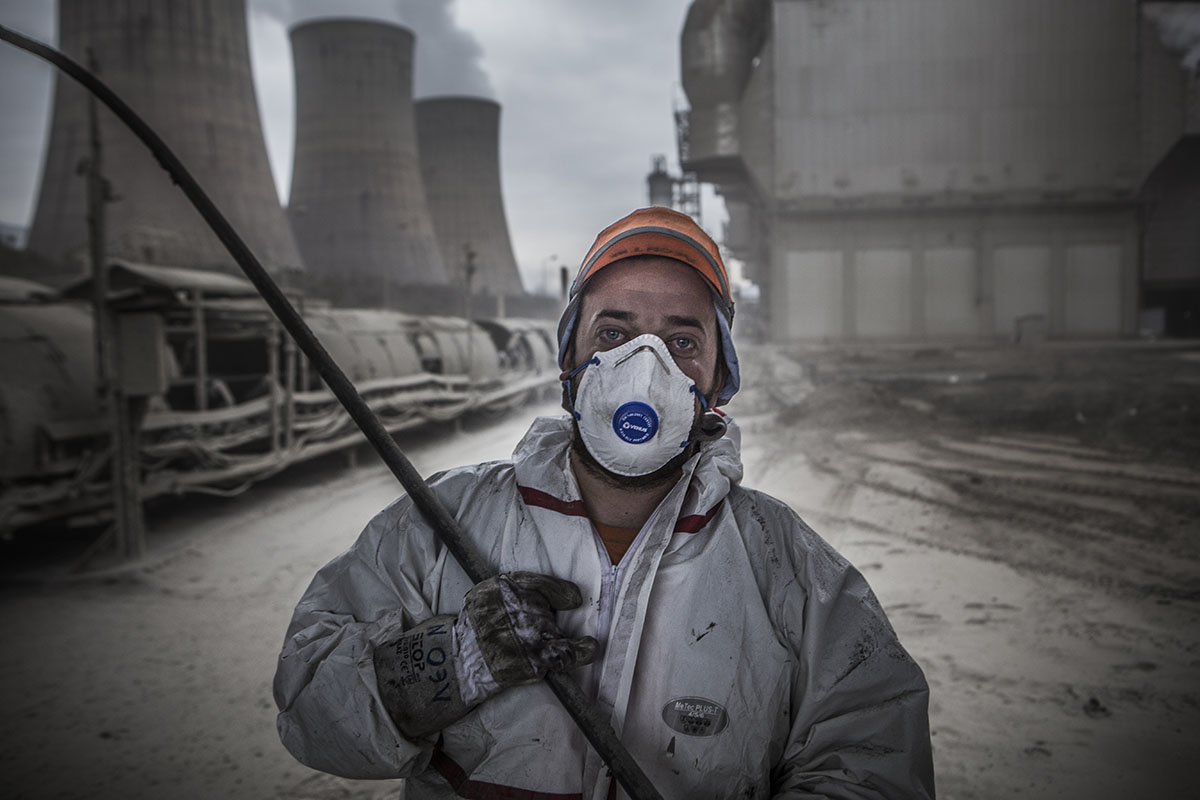 Kosta''s eyes have turned red from the dust. Everyday he has to clean the dust and ash produced by the mine in order to keep the electricity production running. The staff works 24/7 seven days a week.
