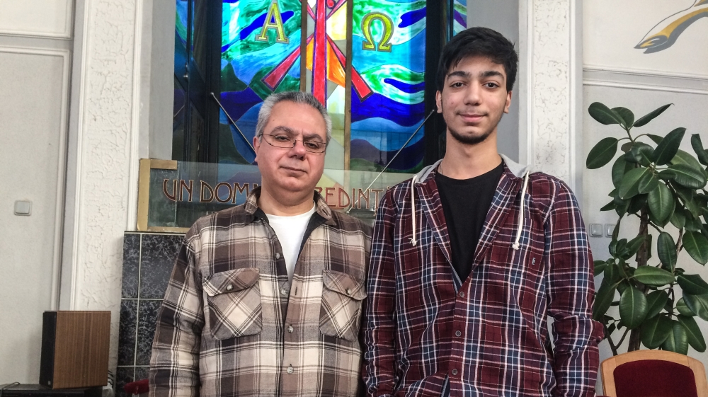 Mehran Davari and his son Daniel are from Iran. They converted to Christianity and have sought asylum in Romania [Lorelei Mihala/Al Jazeera]