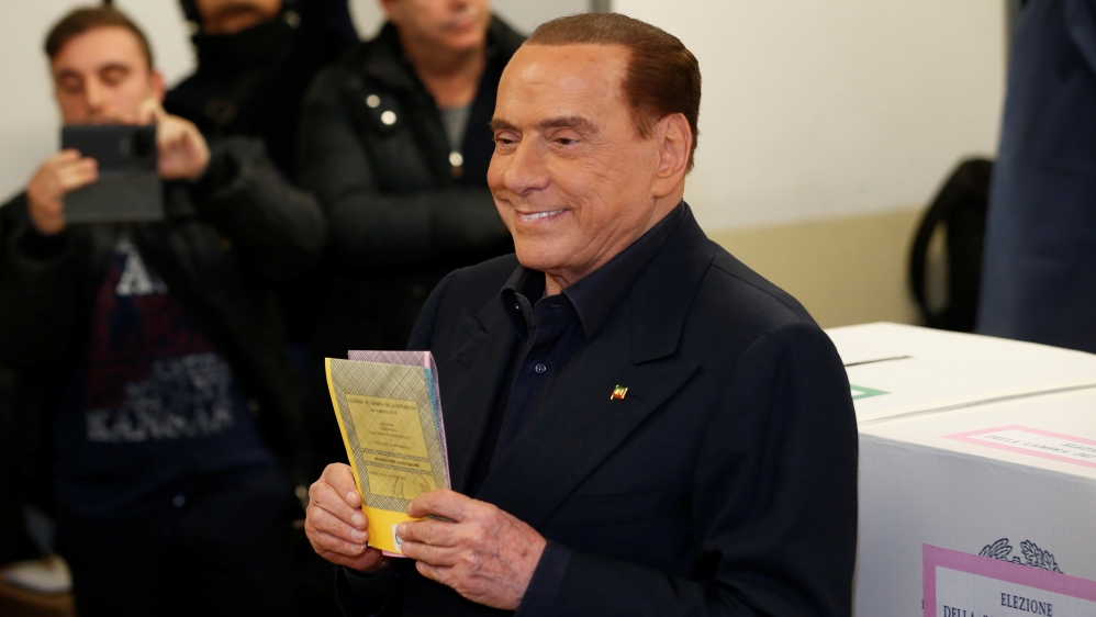 Forza Italia party leader Silvio Berlusconi casts his vote at a polling station in Milan