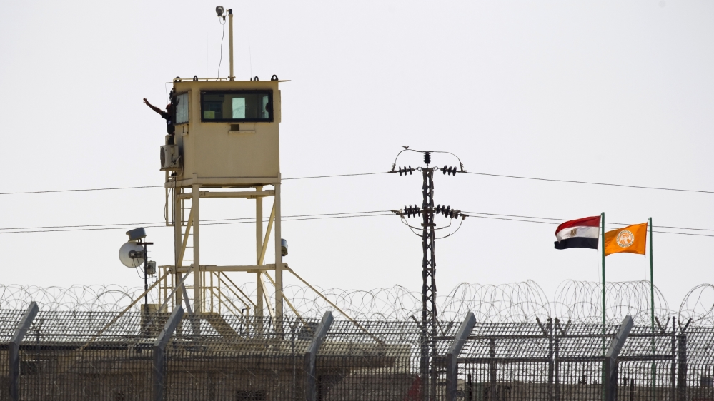 A member of Egypt''s security forces stands on watchtower in North Sinai