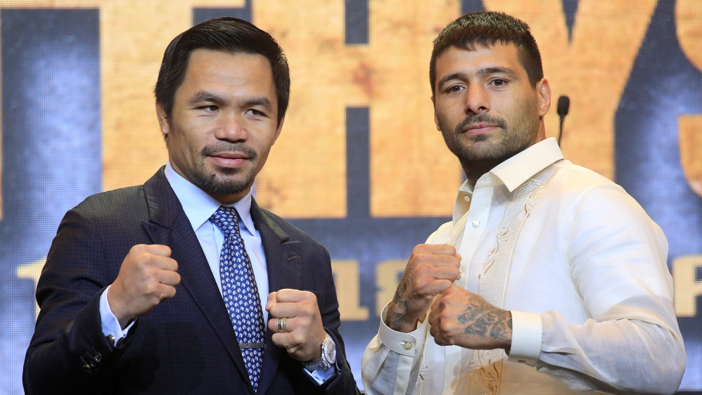 Pacquiao and Matthysse attend a news conference for their upcoming WBA "regular" welterweight title fight, in Paranaque city, metro Manila