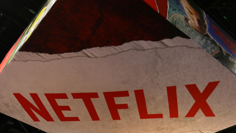 The Netflix logo is shown above their booth at Comic Con International in San Diego,