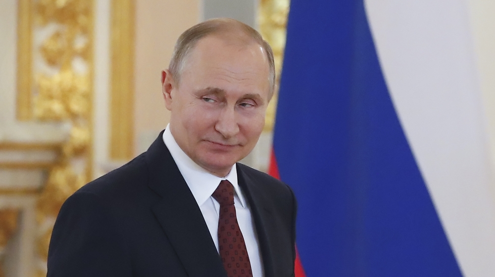 Russian President Vladimir Putin attends a ceremony