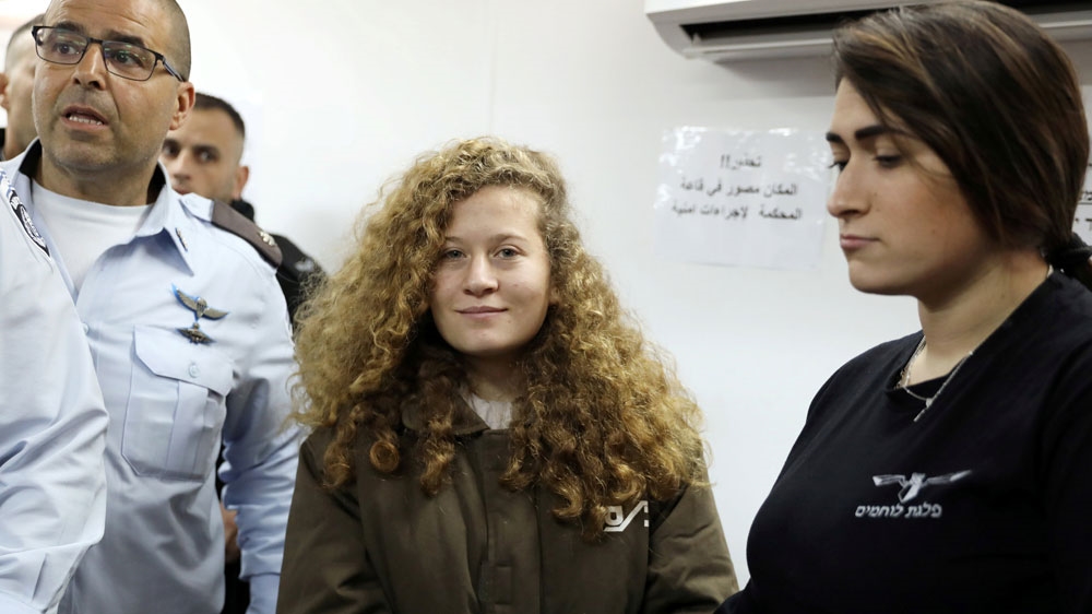 Ahed is seen here at Ofer Prison near Ramallah on January 15 [File: Ammar Awad/Reuters]