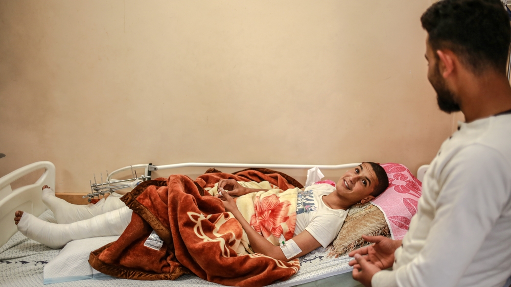 Marwan Yassin says he and his friend wanted to plant the Palestinian flag along the border [Hosam Salem/Al Jazeera] 