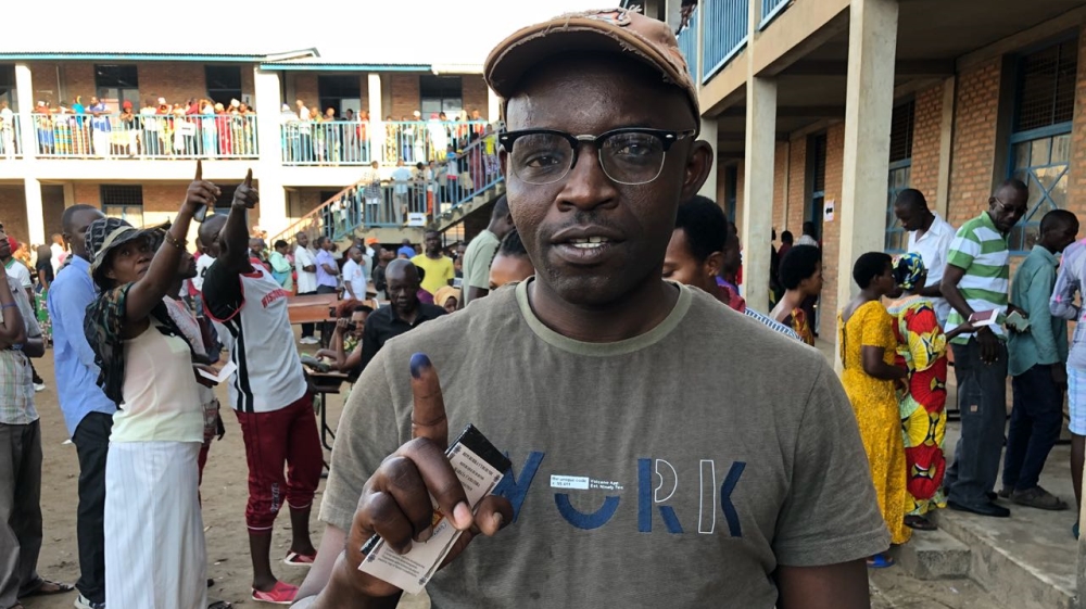 The changes will be adopted if more than 50 percent of cast ballots are in favour [Evelyn Kahungu/Al Jazeera]