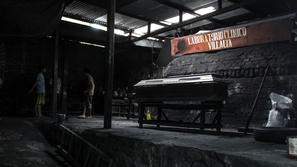 The demand for coffins has forced manufacturers to improvise their workshops [Ali Rae/Al Jazeera]