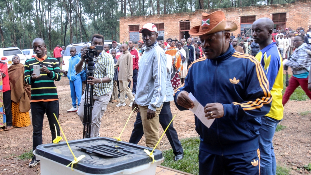 A yes vote could extend Pierre Nkurunziza's (right) rule until 2034 [Evrard Ngendakumana/Reuters]