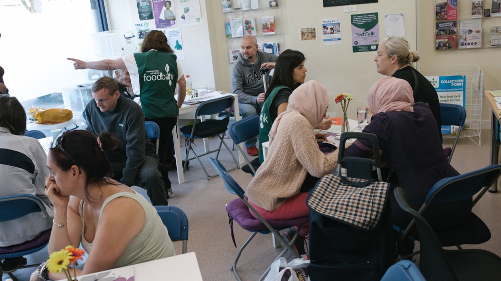  Food-bank staff attend to clients [James Rippingale/Al Jazeera] Food-bank staff attend to clients [James Rippingale/Al Jazeera]