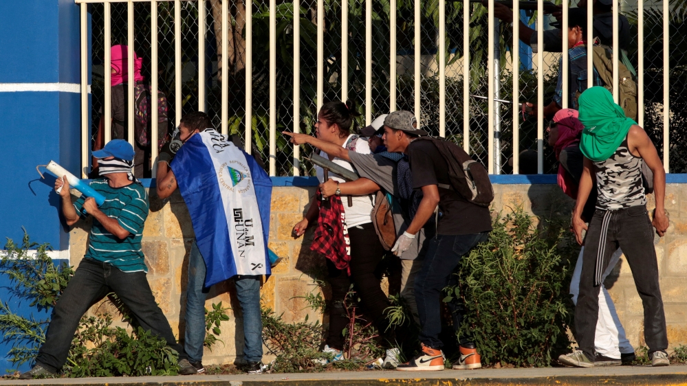 Demonstrators clash with riot police during a protest against Nicaragua''s President Daniel Ortega''s government in Managua