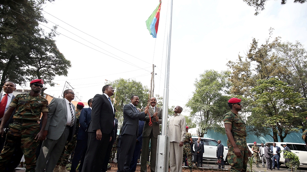 Eritrea''s President Isaias Afwerki and Ethiopia''s Prime Minister, Abiy Ahmed raise Eritrea''s flag during a inauguration ceremony marking the reopening of the Eritrean embassy in Addis Ababa, Ethiopia
