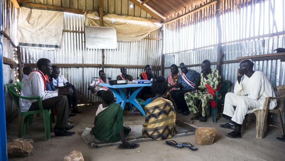 POC3's bench court hears a dispute between two women - the local court was created to resolve minor problems within the community [Tendai Marima/Al Jazeera]