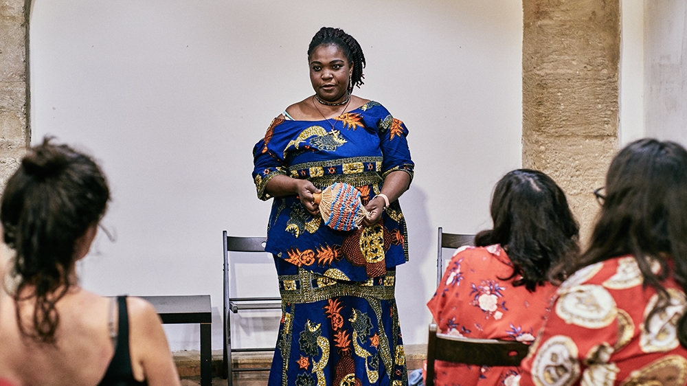 Egbon, who is originaly from Lagos, was trafficked to Italy herself [Naomi Morello/Al Jazeera]