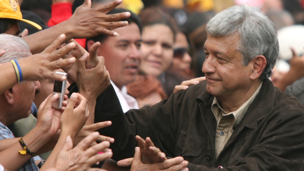 Obrador swept to a historic victory with his Morena party been described as 'more of a social movement than a party' [Daniel Aguilar/Reuters]