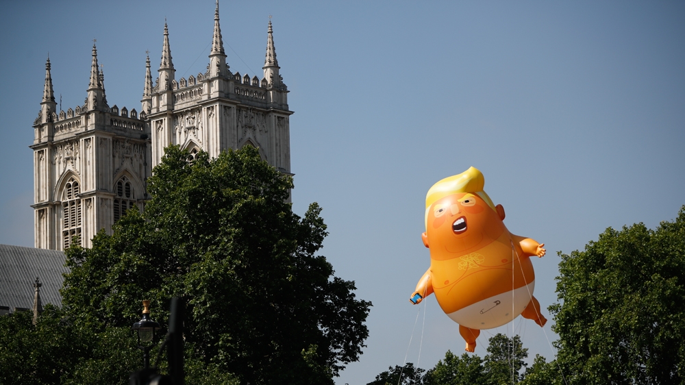 Tens of thousands are expected to protest in central London [Tolga Akmen/AFP] 