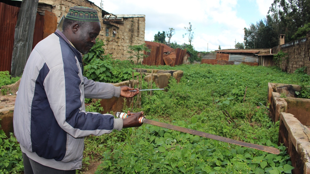 Daniel Mbogori, a 54-year-old private security officer, says he has cut off limbs of 40 thieves in nearly 10 years [Idris Mukhtar/Al Jazeera]