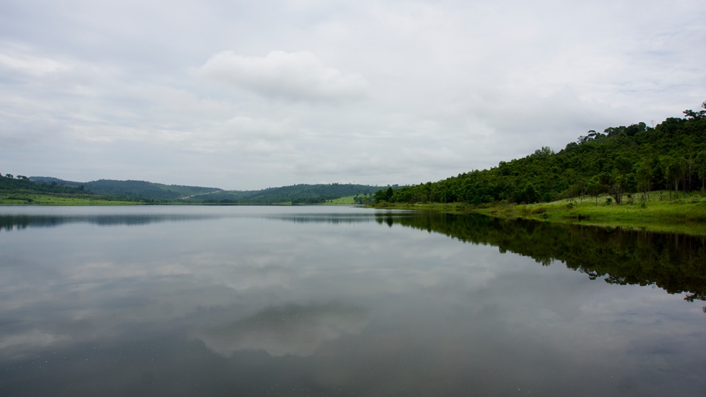 This artificial lake was created by damming a small river, which flooded local farmland [Andrew Nachemson/Al Jazeera]