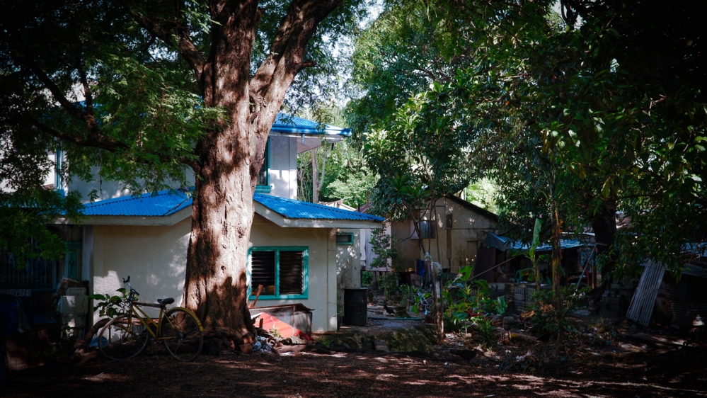 San Salvador is one of many fishing communities among the islands in Masinloc Bay. A mix of concrete homes and wooden shacks house the hundred or so residents of the island community [Santiago Arnaiz/Al Jazeera]
