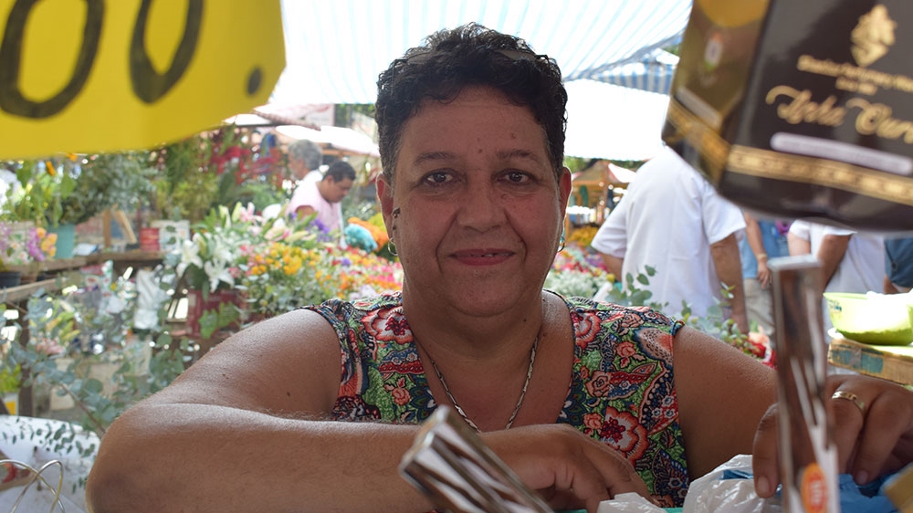 Analice Moreira, 56, has been a figure at Gloria's market for more than two decades [David Child/Al Jazeera]