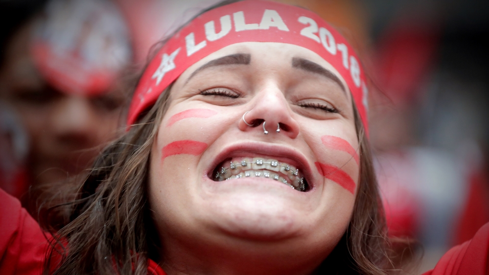 Supporters of Fernando Haddad participate in an event in defence of work and education in Sao Paulo, Brazil [File: Fernando Bizerra Jr/EPA] 
