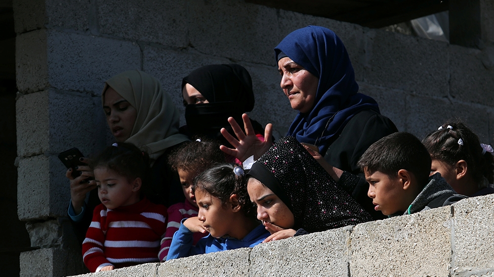People watch the funeral of Palestinian Khaled Qwaider, who was killed in an Israeli air strike, in Khan Younis in the southern Gaza Strip November 12, 2018. REUTERS/Suhaib Salem