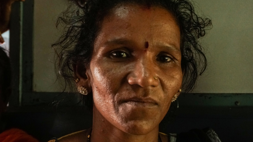 Neelam Prakash Ravate is one of thousands of women attending the march [Shone Satheesh/Al Jazeera]