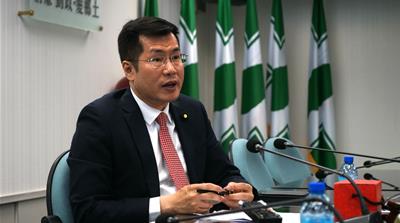 DPP politician Lo Chi-cheng [James Reinl/Al Jazeera]