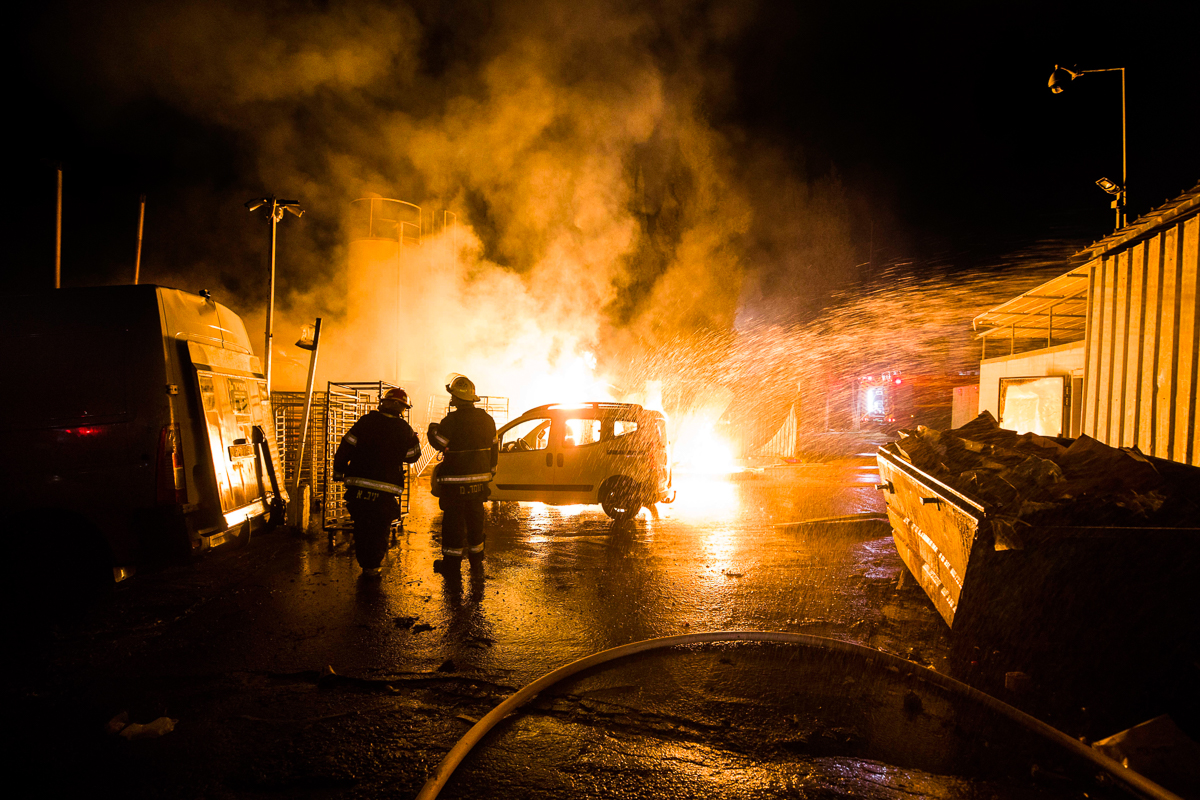 Israeli firefighters work at the scene where a rocket fired from the Gaza Strip hit in Sderot, Israel, Monday, Nov. 12, 2018. Israel''s military says it is prepared to step up its efforts against Pales