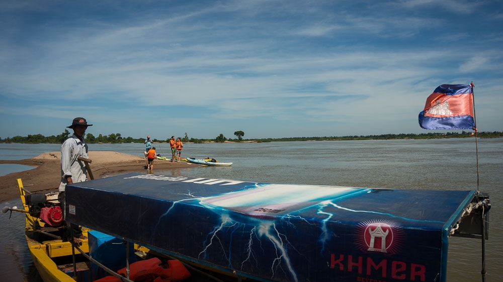 Tourist boats going to see the dolphins risk disturbing the endangered species [Nathan Thompson/Al Jazeera]